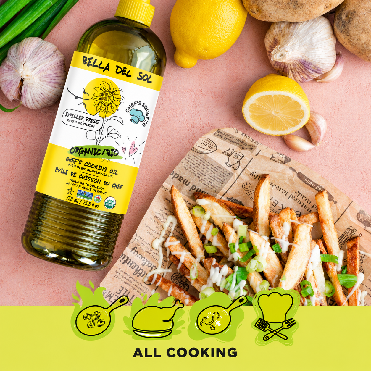 
                  
                    A bottle of Bella Del Sol Organic Cooking Oil is displayed on a pink background with food props including french fries, garlic, lemons, and green onions. The bottle has a yellow cap and a white label with a yellow sun illustration.
                  
                