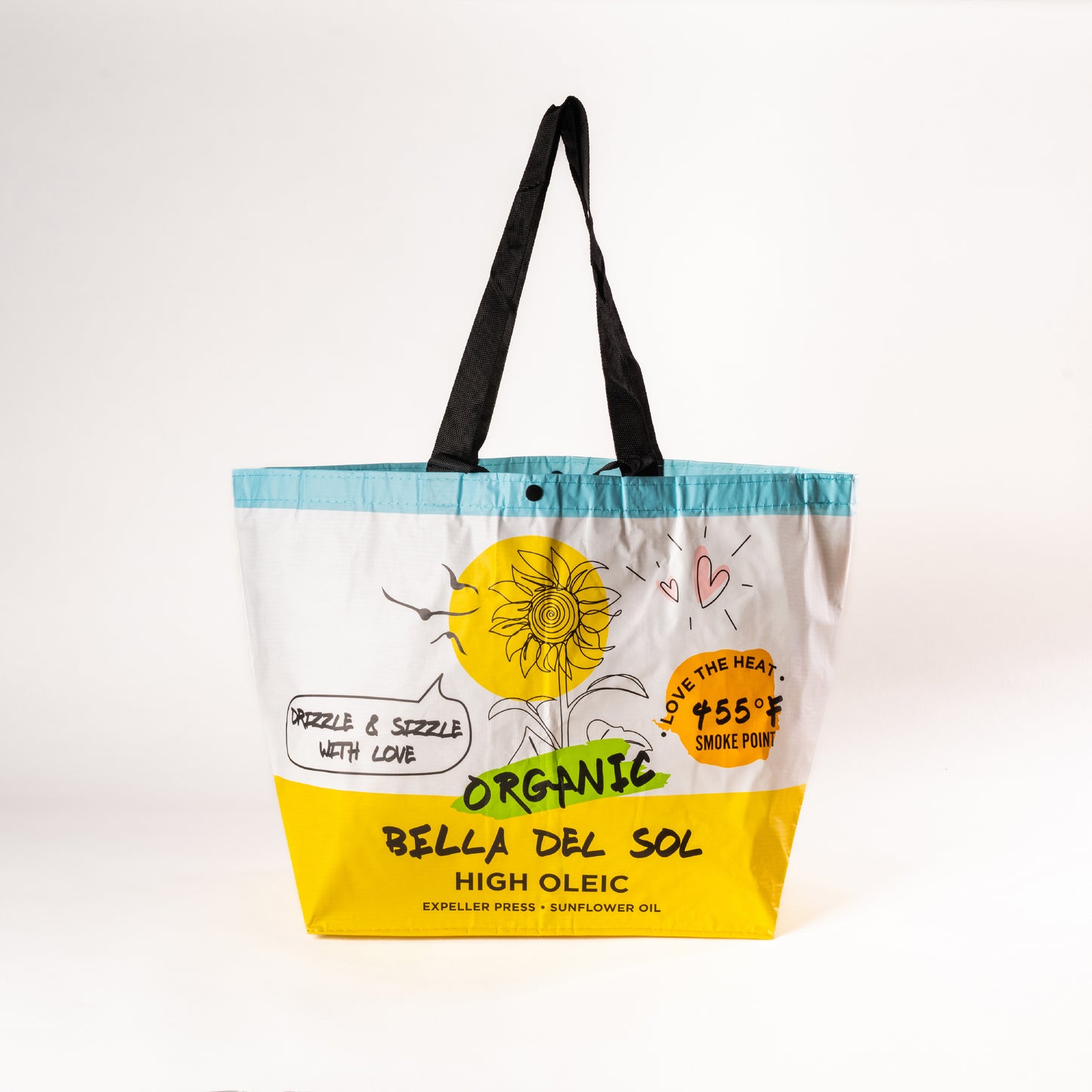 
                  
                    Bella Del Sol yellow reusable grocery bag with branded logo, shown in a standing position with reinforced handles and eco-friendly design.

                  
                