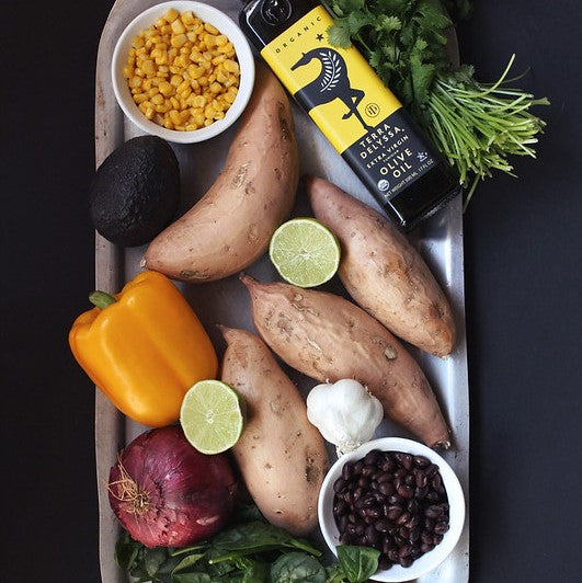 Spicy Southwest Loaded Sweet Potatoes With Cilantro Lime Avocado Cream