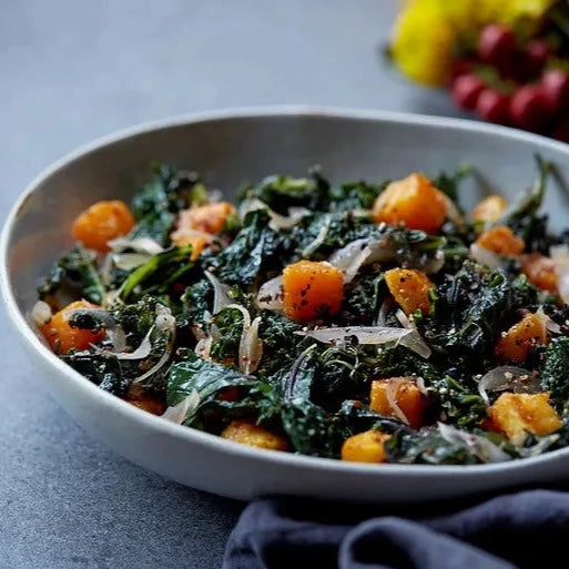 Wilted Kale Salad With Warm Mustard Shallot Vinaigrette And Spicy Butternut Squash Croutons